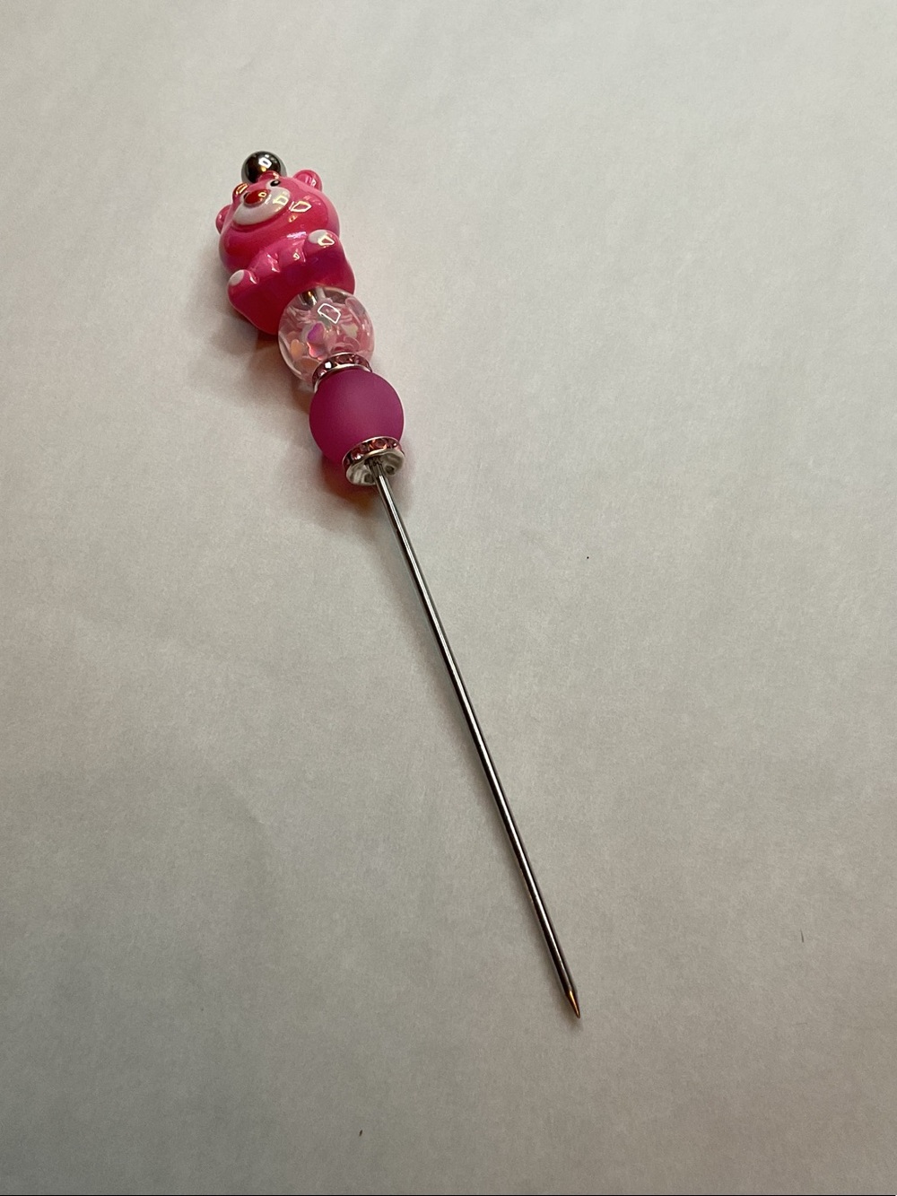 Pink Pokey tool with pink bear